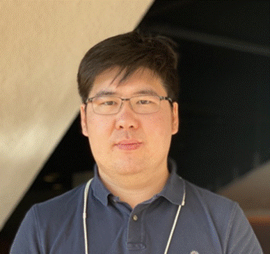 A person wearing glasses Description automatically generated with medium confidence